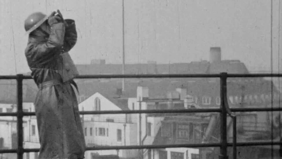 Barclays Bank's London HQ adapts to wartime banking, as a keen amateur filmmaker records staff at work, rest and play.