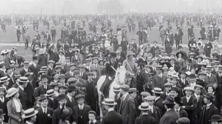 Three cheers for women's right to vote! Thousands of 'peaceful, law-abiding Suffragists' - and their hat-waving supporters - converge on Hyde Park.