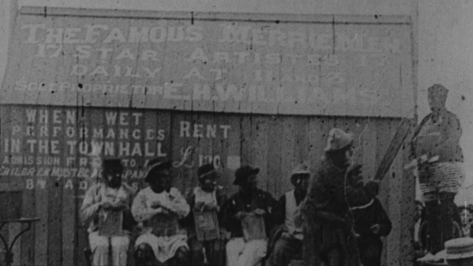 Fun on Rhyl seafront as E. H. Williams and his troupe entertain crowds with much ducking and diving in this hectic act.