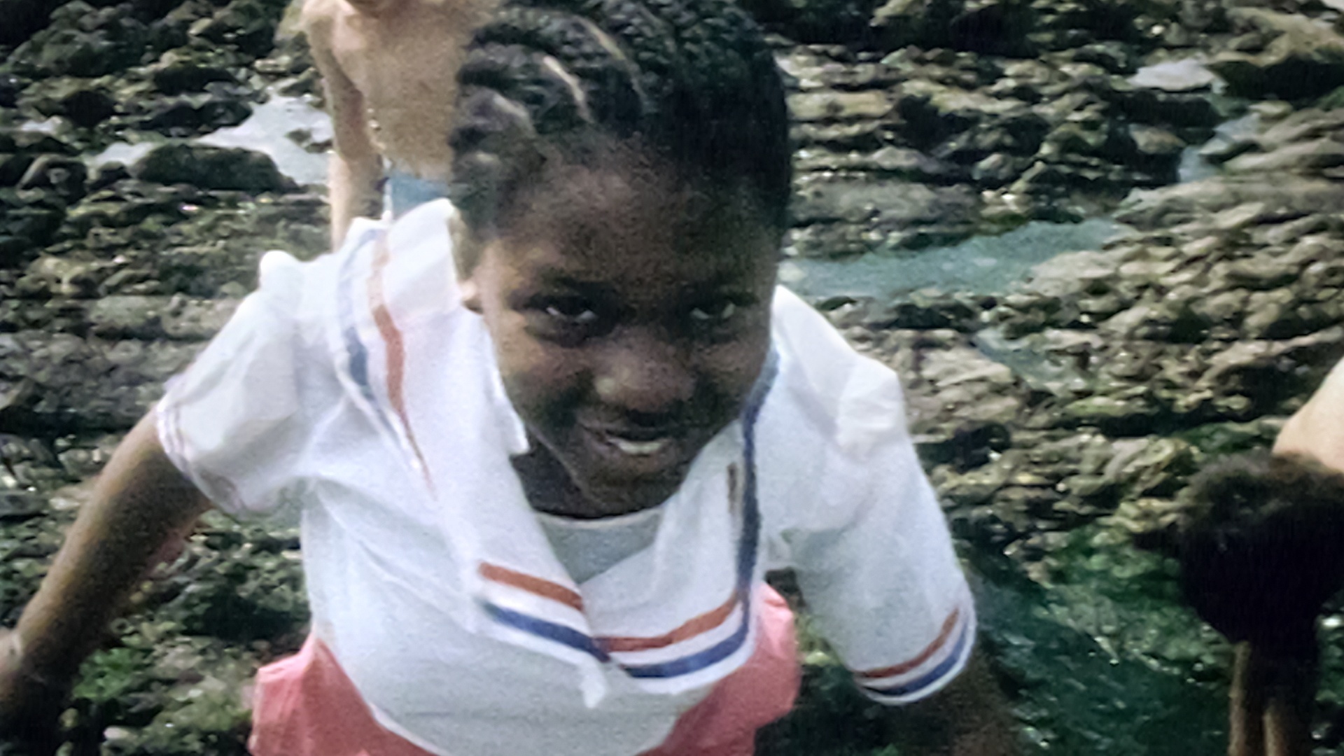Children from inner city Brixton in London having fun at Wembury Beach.