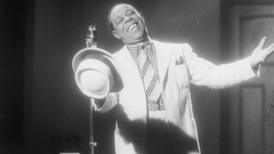 Black music hall stars Scott and Whaley perform stereotypical minstrel routines in blackface in this 1937 touring revue.