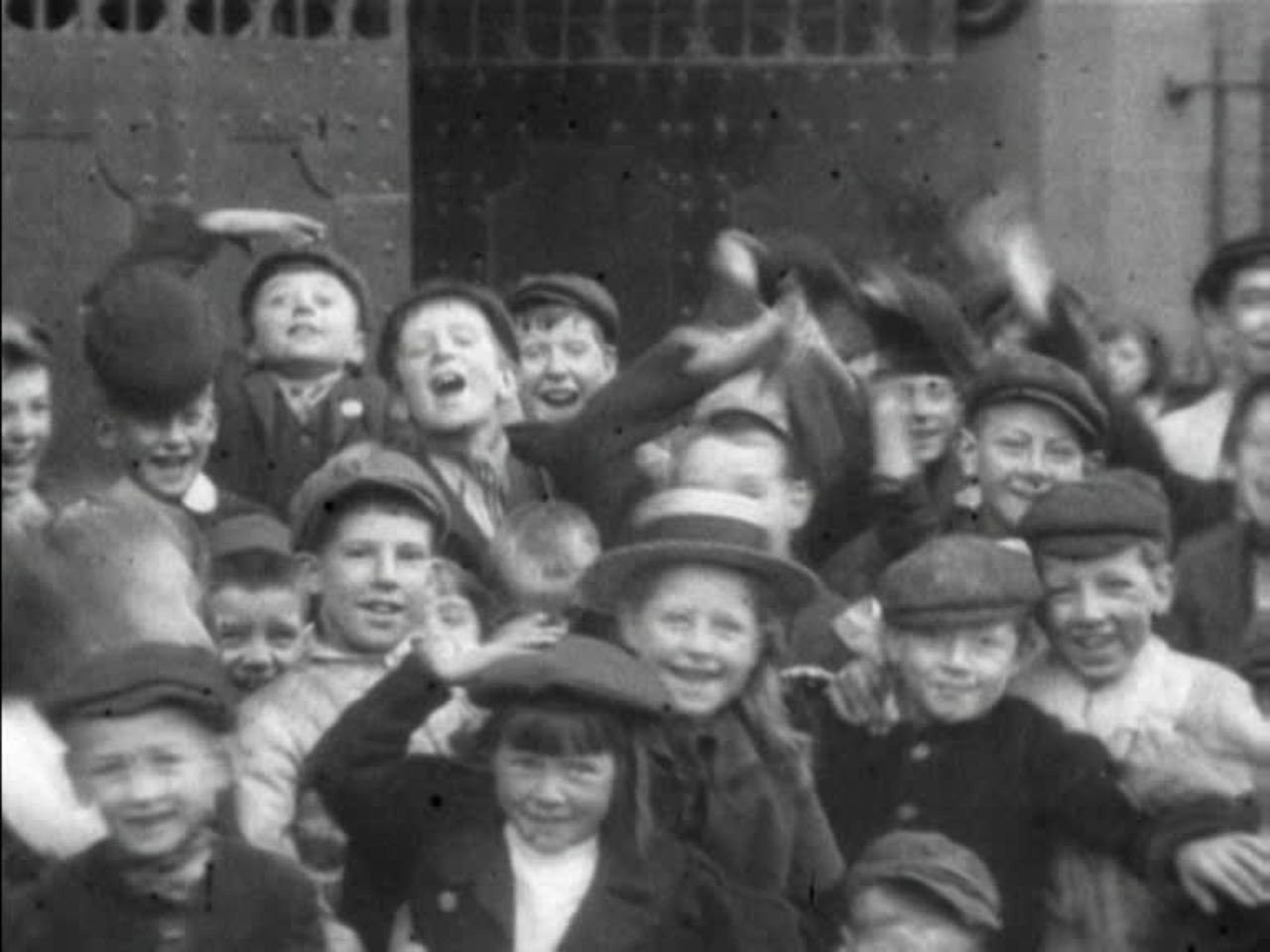 An unidentified workplace is the scene of a vivid slice of turn-of-the-century life.