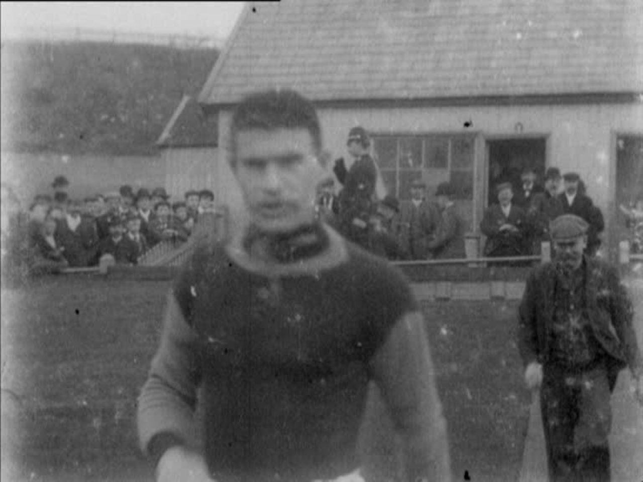 The entry of the teams and action from both halves of an Edwardian football game at Ewood Park.