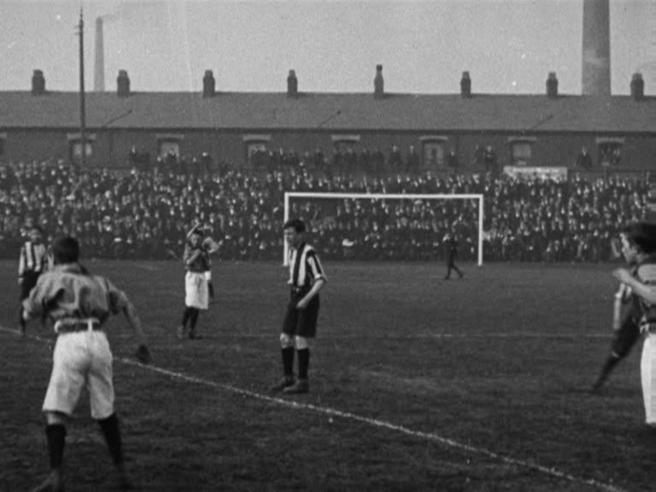 Schoolboy footballers fight it out at Ewood Park.