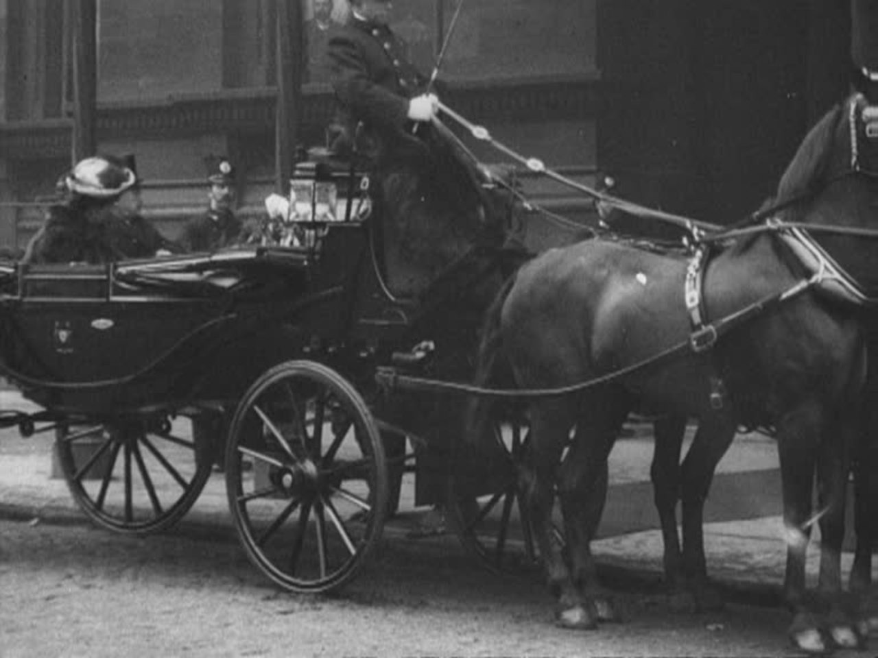 A bagpipe band marches in honour of Princess Louise, Duchess of Argyll, on her visit to Liverpool.