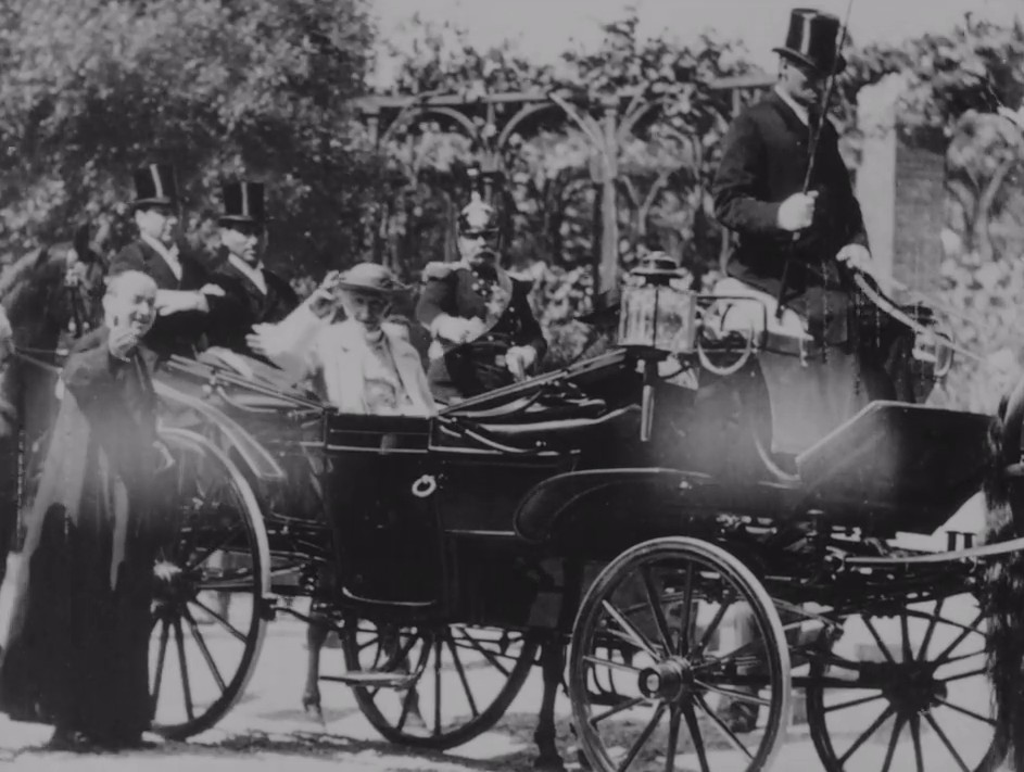 The Pope arrives in a carriage and bestows a blessing.