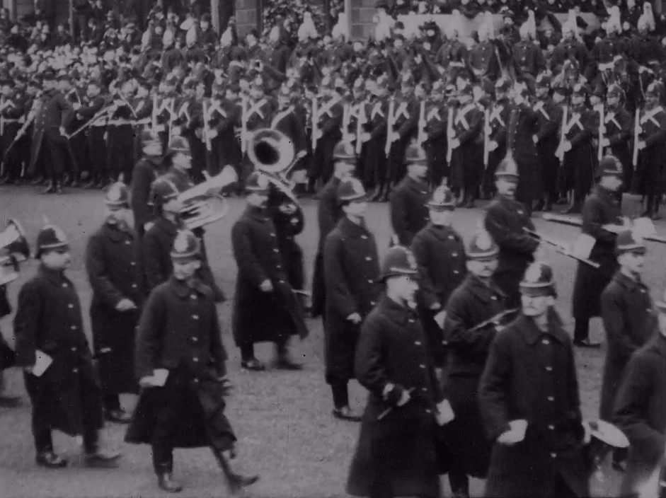 The funeral procession approaches Paddington