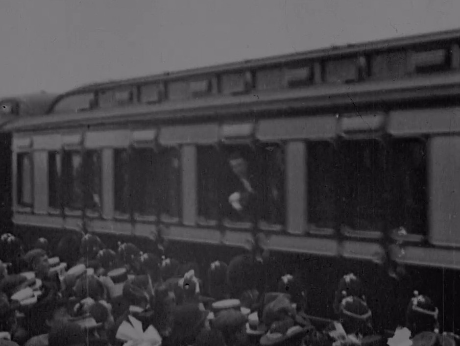 Detective work reveals... this very early film was shot at Southampton Royal Pier Station. But who's the VIP on board?