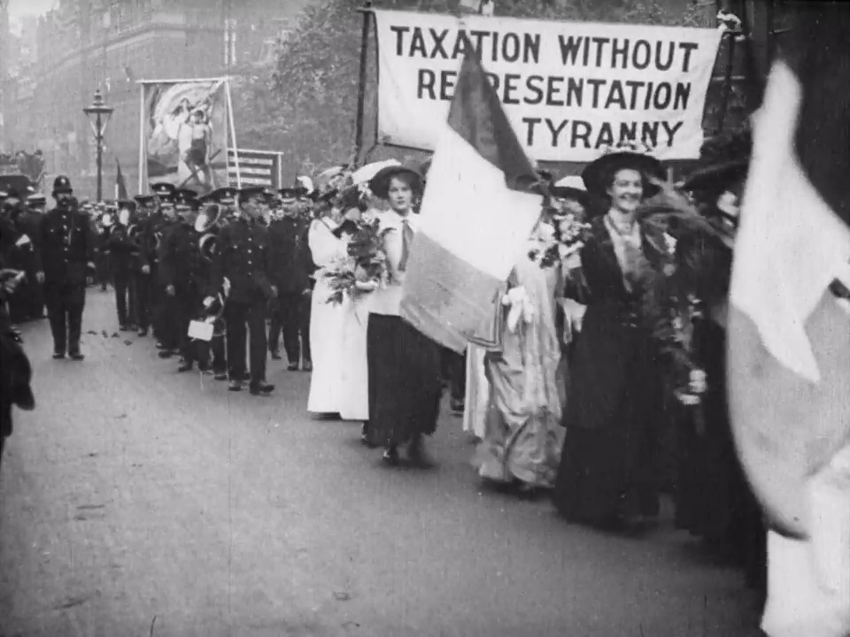 Multitudes of women protest on the streets of London in a demonstration organised by the Women's Social and Political Union on 18 June 1910.