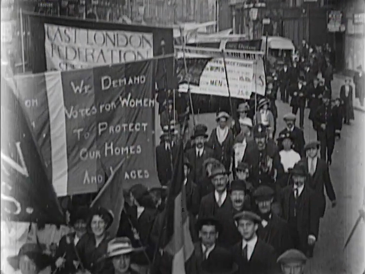Suffragettes advance from Bow to Baker Street, jostling with the London traffic on their way to the Portman Rooms.
