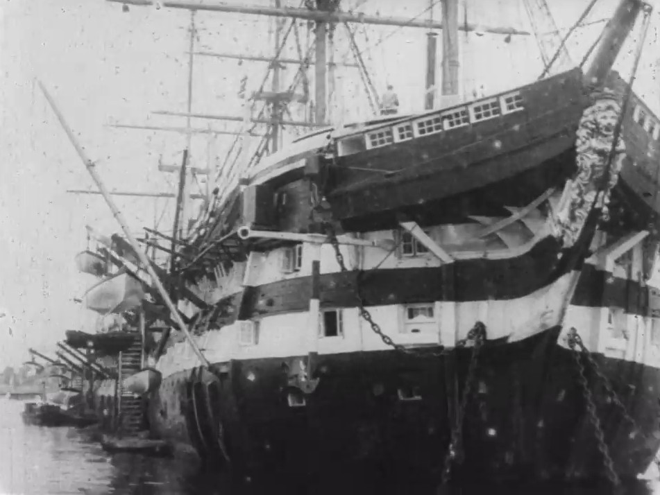 Panorama of two wooden battleships, both by this time used as training ships for naval cadets