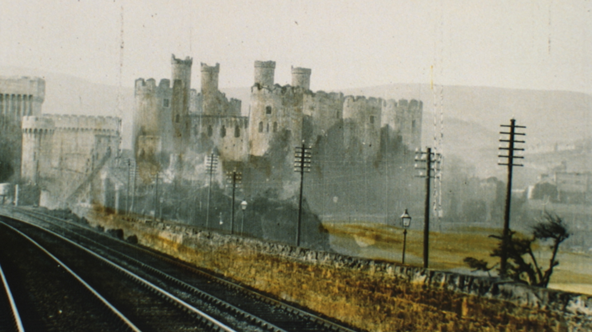 Conwy's bridge, castle and station glide past, as if in a dream, in this beautiful phantom train ride film (no ghosts but apparently no train either) from 1898.
