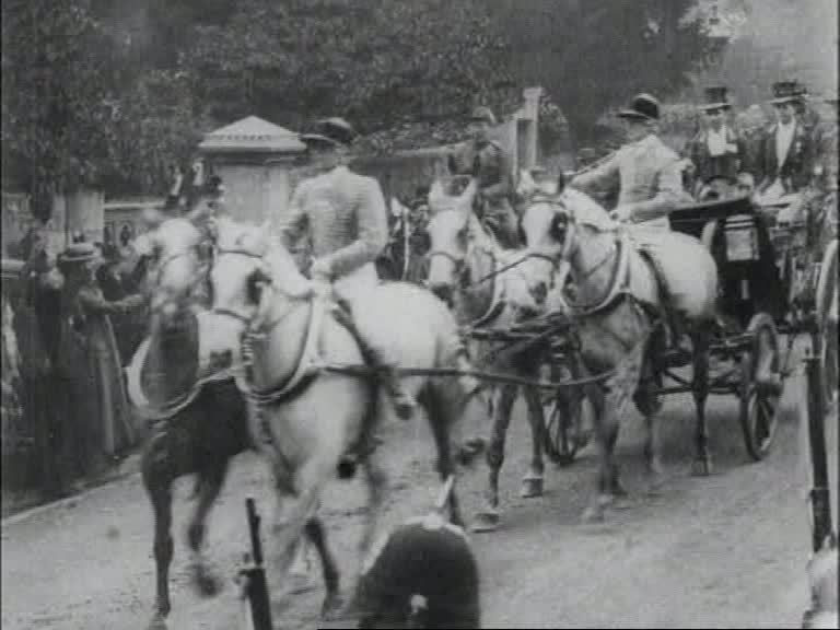 Crowds line up for a fleeting glimpse of the Prince of Wales, later George V.