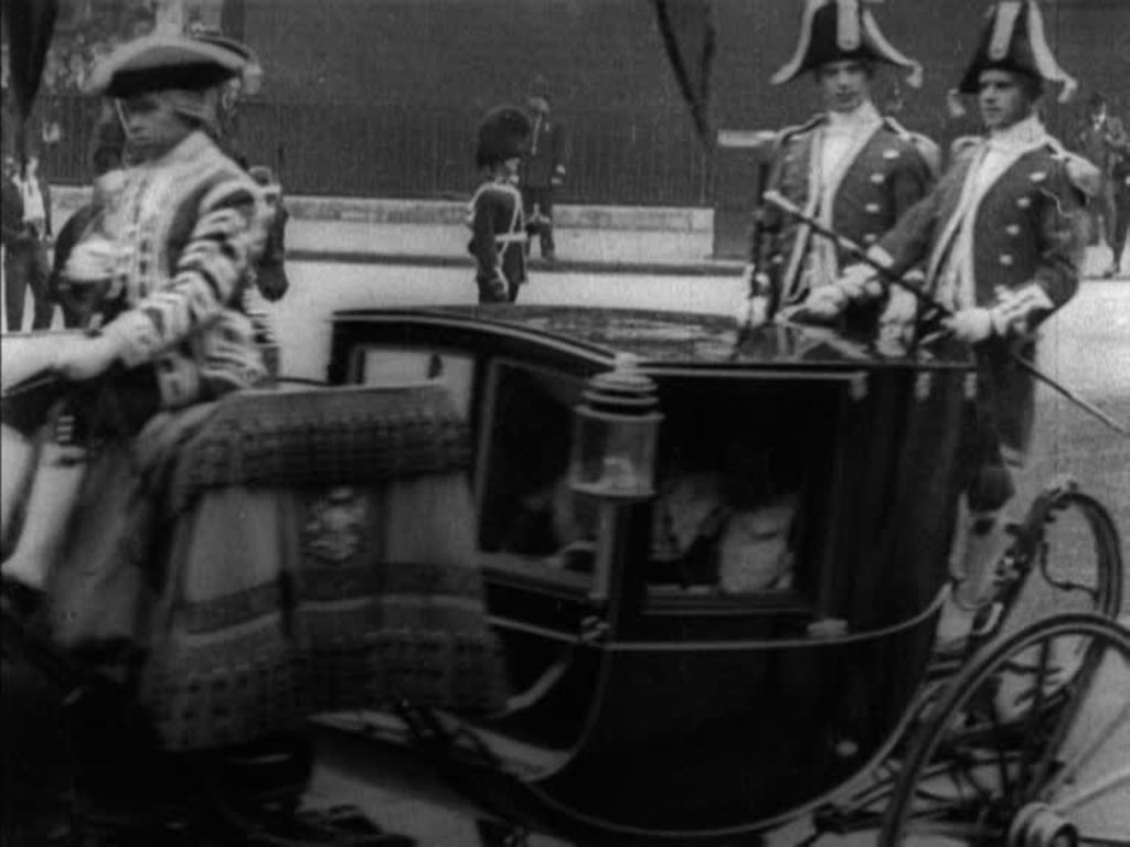 The crowds stand silent as the nation says goodbye to Queen Victoria in February 1901.