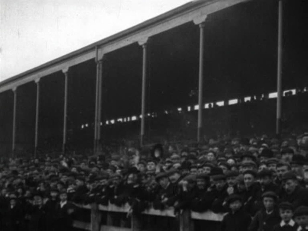 The Lillywhites take on the Wolves at Deepdale, watched by a large crowd and the club mascot.