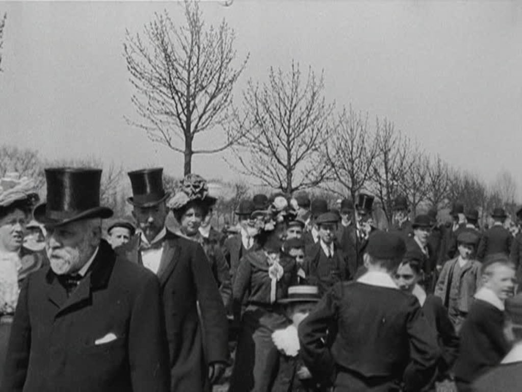 Kingston-upon-Hull residents take the air and feed the birds in their Sunday finery.
