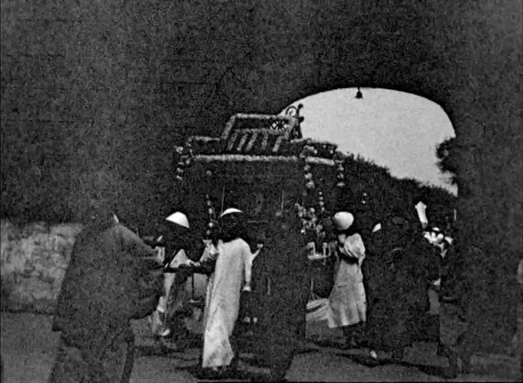 A sumptuous city wedding, captured on film by a retired British teacher and amateur filmmaker, during a trip to China.