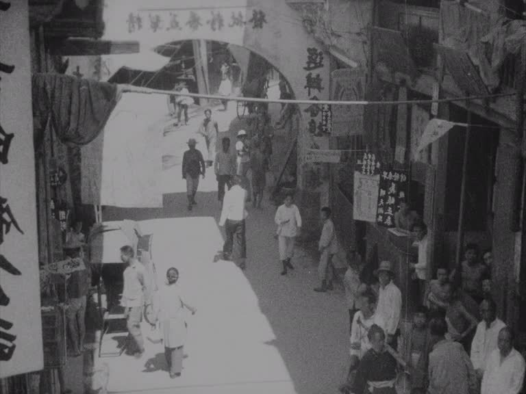 Bustling, fluttering and swaying – wonderful visual details of daily life in a street in Fuzhou (then Foo-chow), Fujian Province in South East China.